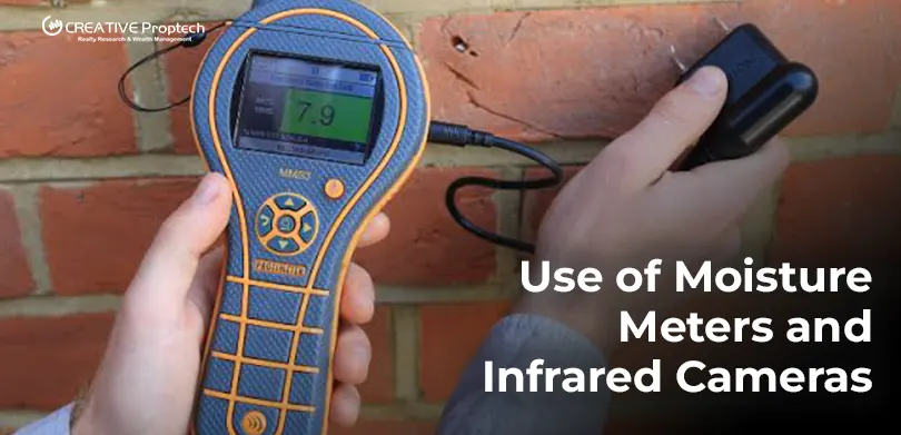 Inspector using a digital moisture meter on a brick wall to check for dampness; text overlay reads 'Use of Moisture Meters and Infrared Cameras' with CREATIVE Proptech logo.