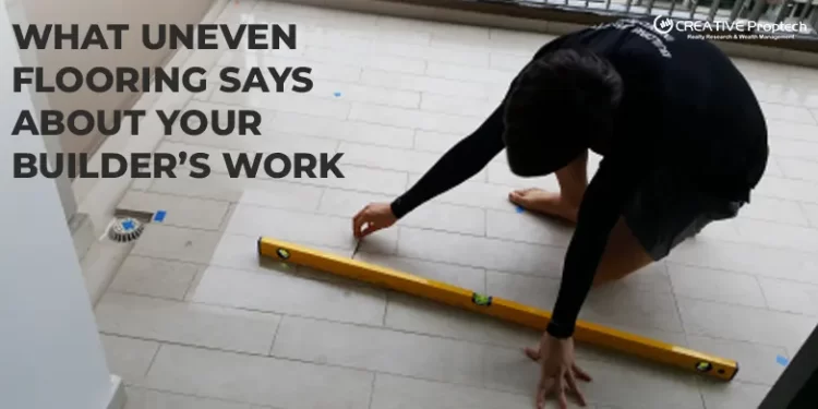 An inspector kneeling on a tiled balcony floor, using a spirit level to check for flatness and unevenness, illustrating the topic: What Uneven Flooring Says About Your Builder's Work.