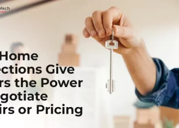 Close-up of a person holding a house key in a newly purchased home with packed boxes in the background; text overlay reads 'How Home Inspections Give Buyers the Power to Negotiate Repairs or Pricing' with CREATIVE Proptech logo.